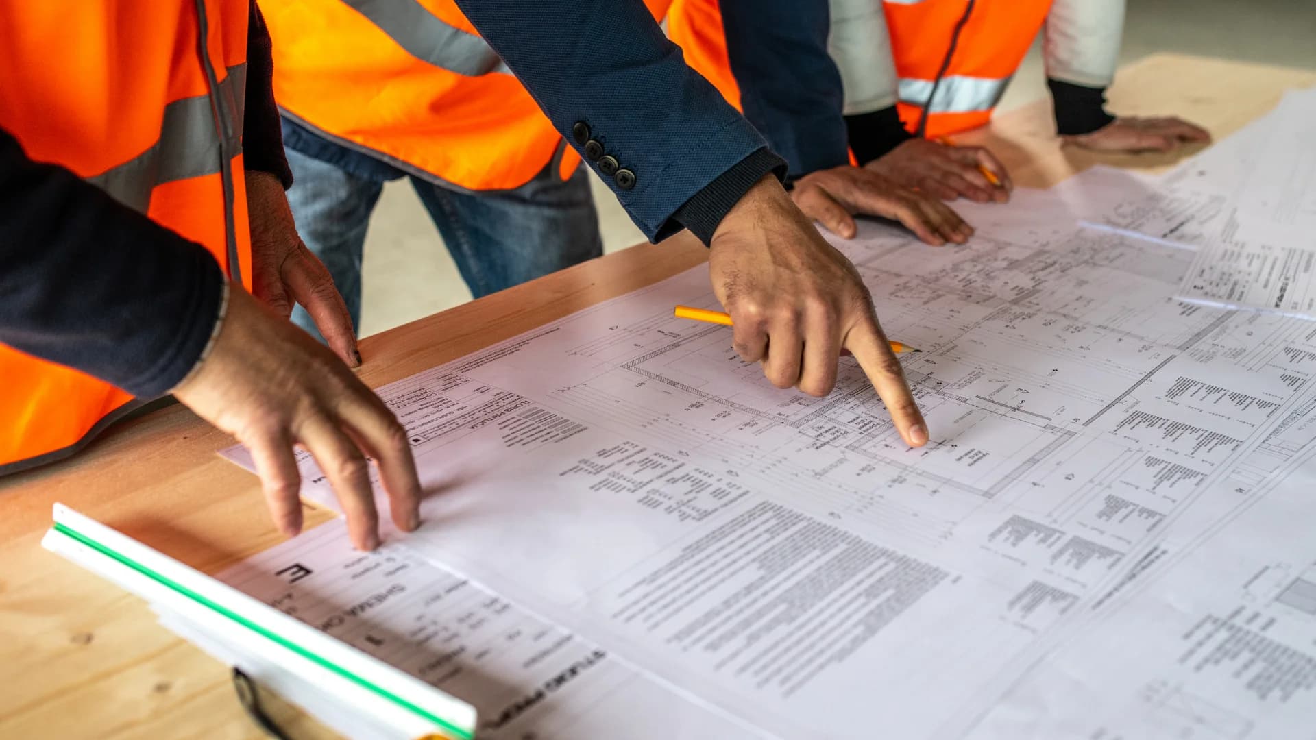 Construction teams working with Fig